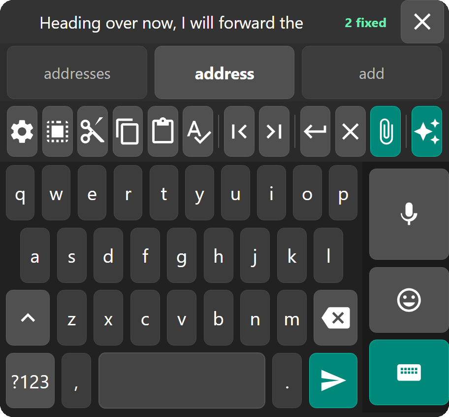 The left-handed layout: QWERTY rows docked left, with a column holding the microphone, emoji and full keyboard